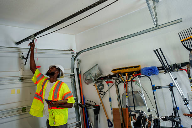 Professional Garage Door Panel Replacement technician working in Pink, OK